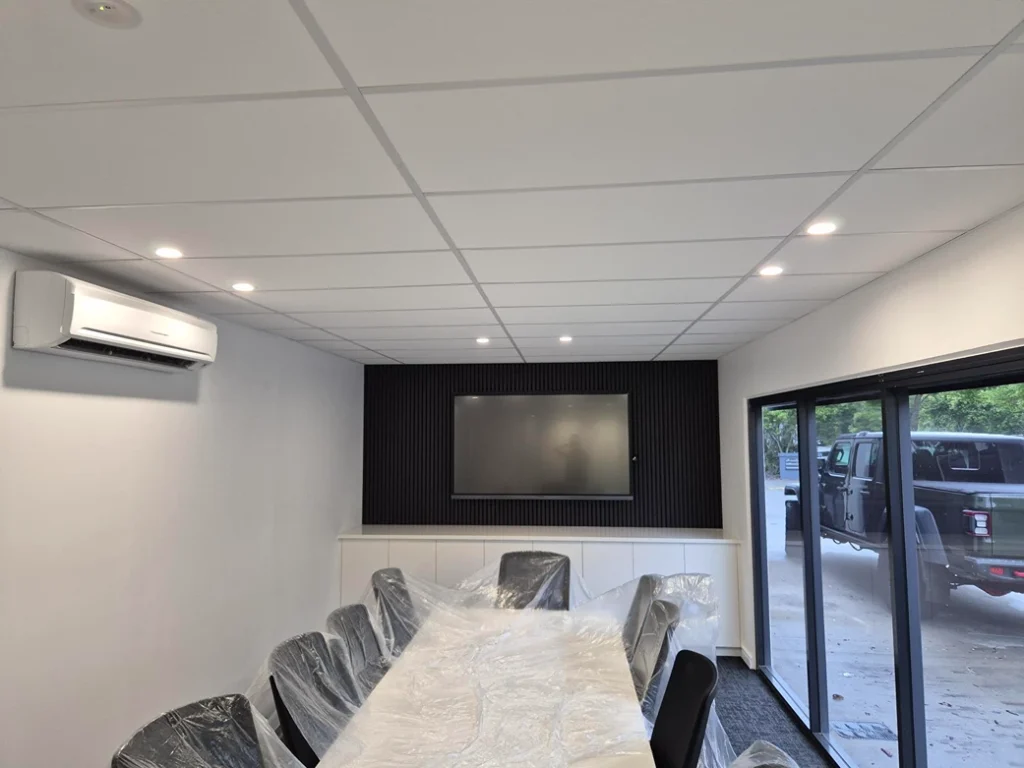 Modern Brisbane dining area featuring a professionally installed split-system air conditioner for efficient indoor climate control and year-round comfort.