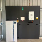 Bright Spark Group complete off-grid solar power system with battery storage and inverter installed inside shed.