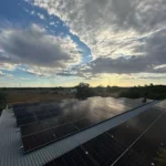 Bright Spark Group residential solar panel installation team working on a rooftop home solar system