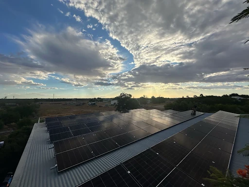 Bright Spark Group residential solar panel installation team working on a rooftop home solar system