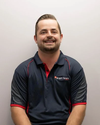 Bright Spark Group electrician team member Brenton Lehman in BSG work shirt