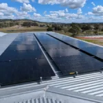 Bright Spark Group solar panels installed neatly on a metal roof in Queensland