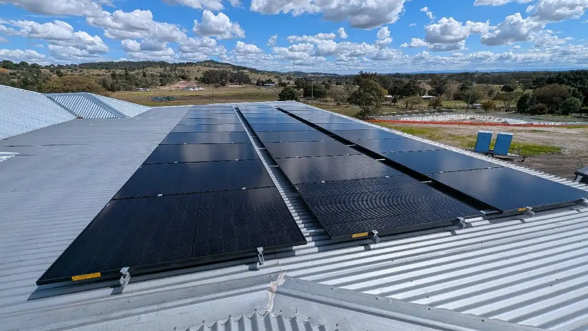 Bright Spark Group solar panels installed neatly on a metal roof in Queensland