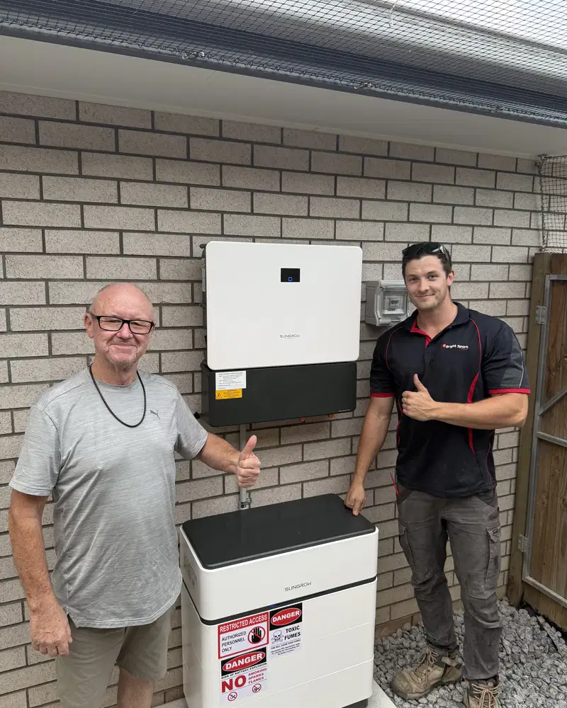 Bright Spark Group team completing a solar battery installation for a Queensland property