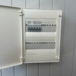 Labelled switchboard with main switch, air conditioning, power and light circuits