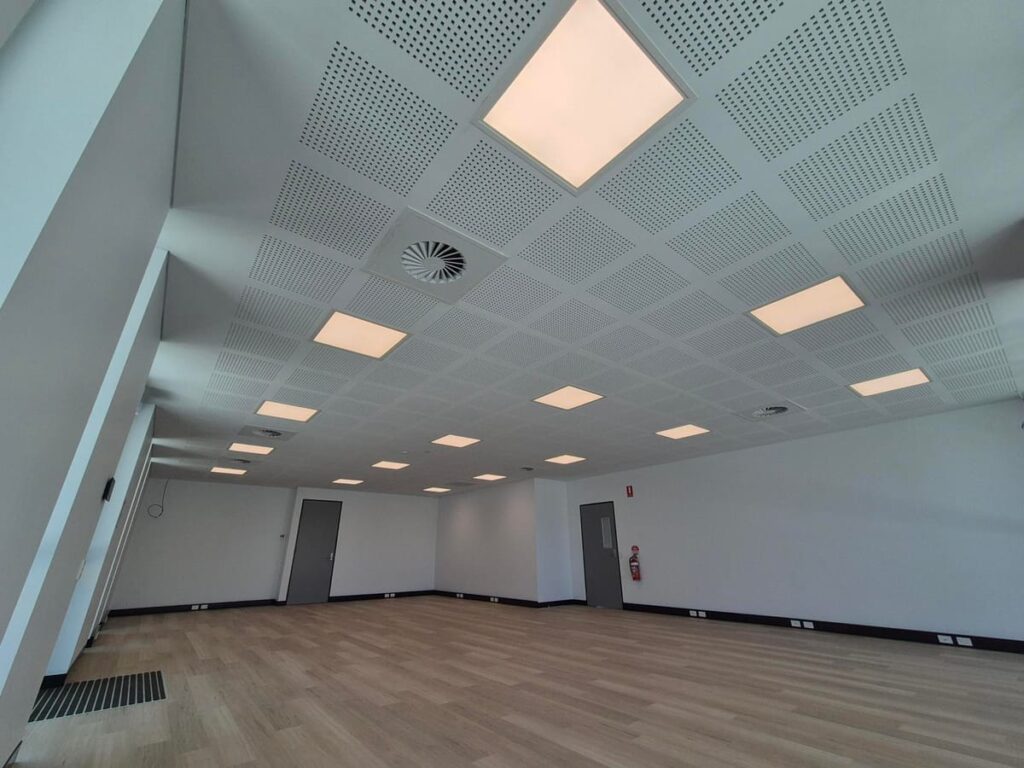Office ceiling with LED panel lights installed in a new fit-out