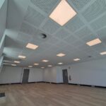 Office ceiling with LED panel lights installed in a new fit-out