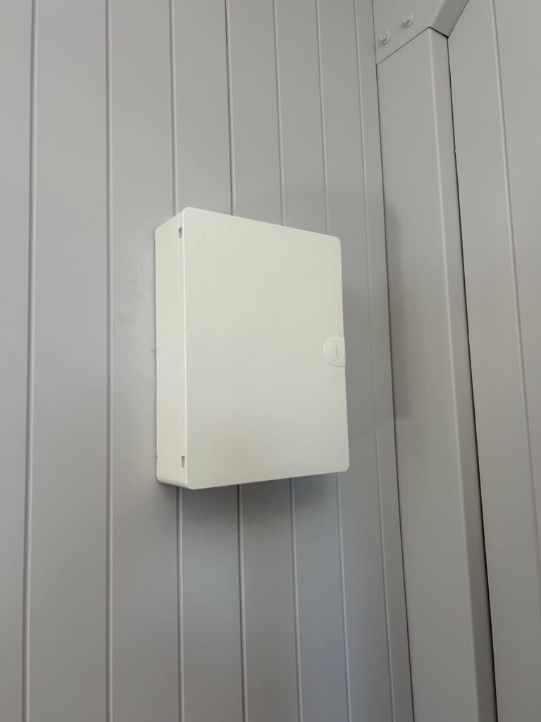 Switchboard enclosure installed on a wall