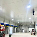 Warehouse with high-bay LED lighting and roller doors
