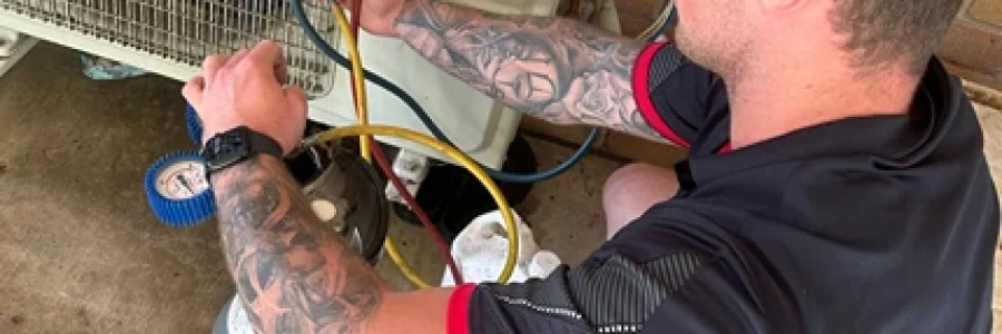 Bright Spark professional conducting maintenance checks and diagnostics on an air conditioning unit to ensure optimal performance.