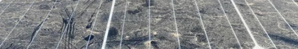 Dust-covered solar panel showing reduced clarity and buildup on the surface.
