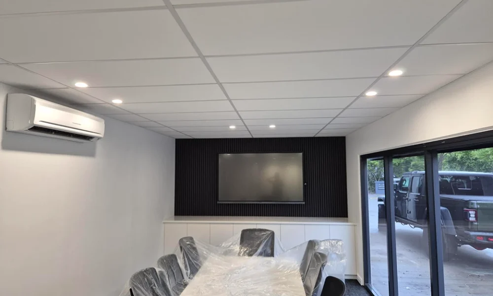 Modern Brisbane dining area featuring a professionally installed split-system air conditioner for efficient indoor climate control and year-round comfort.