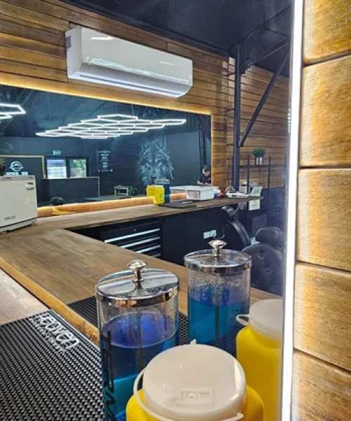 Wall-mounted split system air conditioner installed in a room, providing energy-efficient, targeted cooling with smart control options for small homes and apartments.